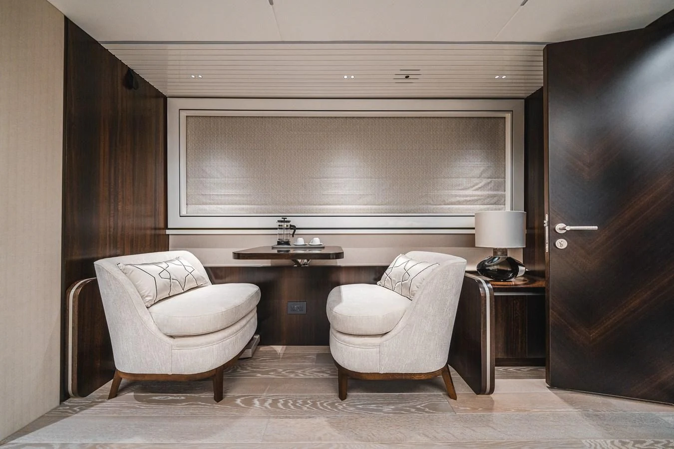 a room with a desk and chairs aboard 90 OCEAN Yacht for Sale