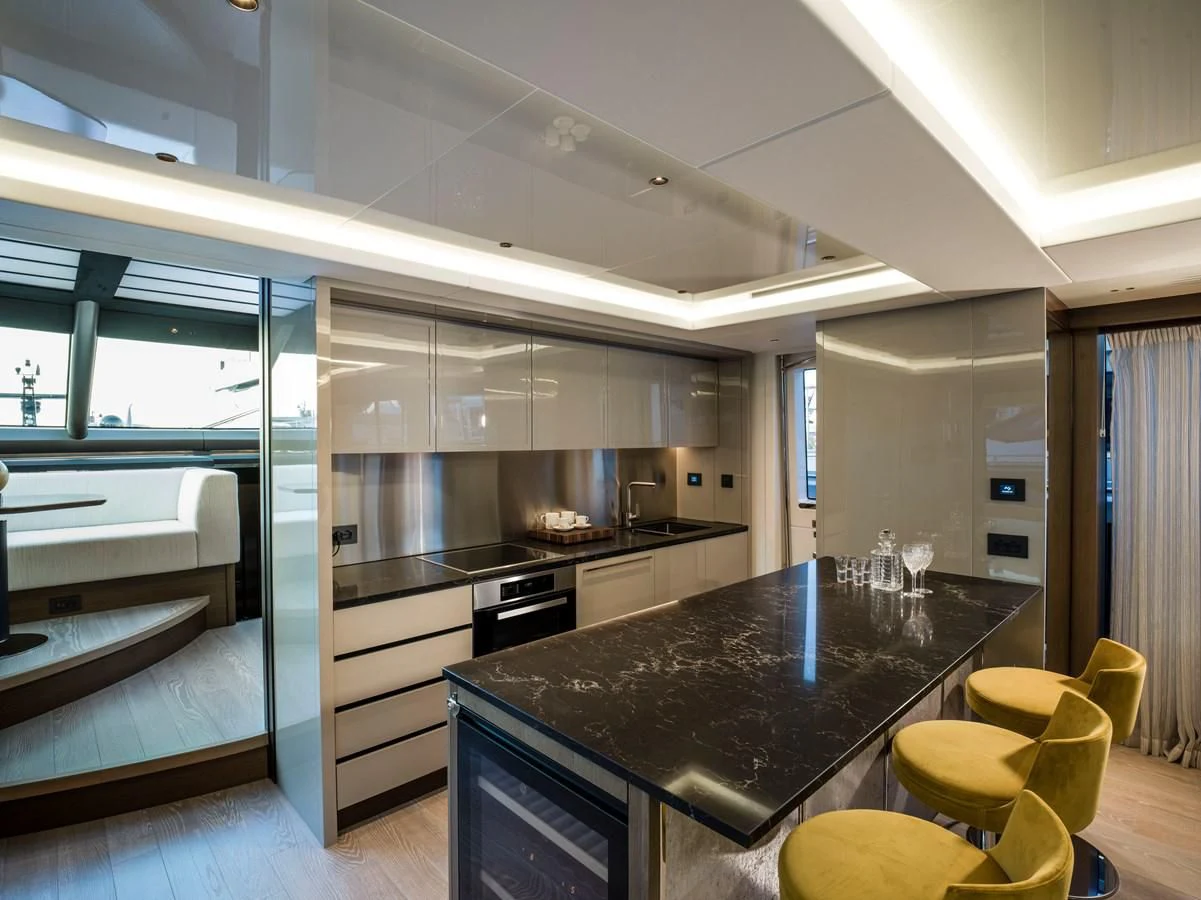 a modern kitchen with a glass door aboard 90 OCEAN Yacht for Sale