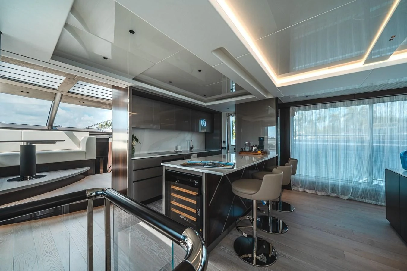 a room with a table and chairs aboard 90 OCEAN Yacht for Sale