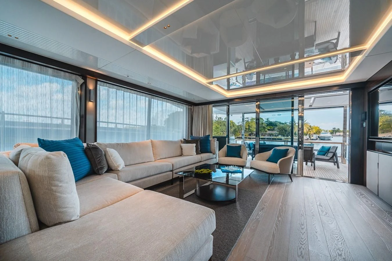 a living room with a large window aboard 90 OCEAN Yacht for Sale