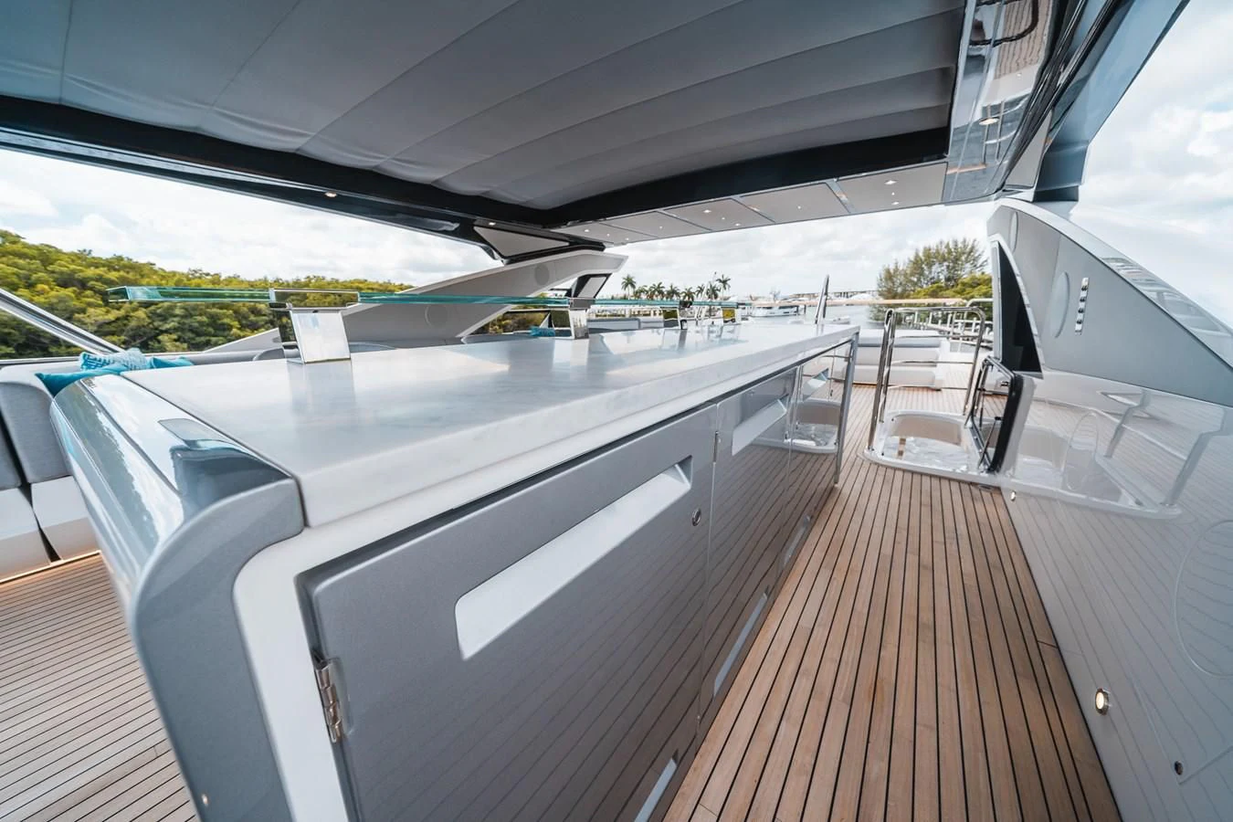 a deck with a deck and a view of the water aboard 90 OCEAN Yacht for Sale