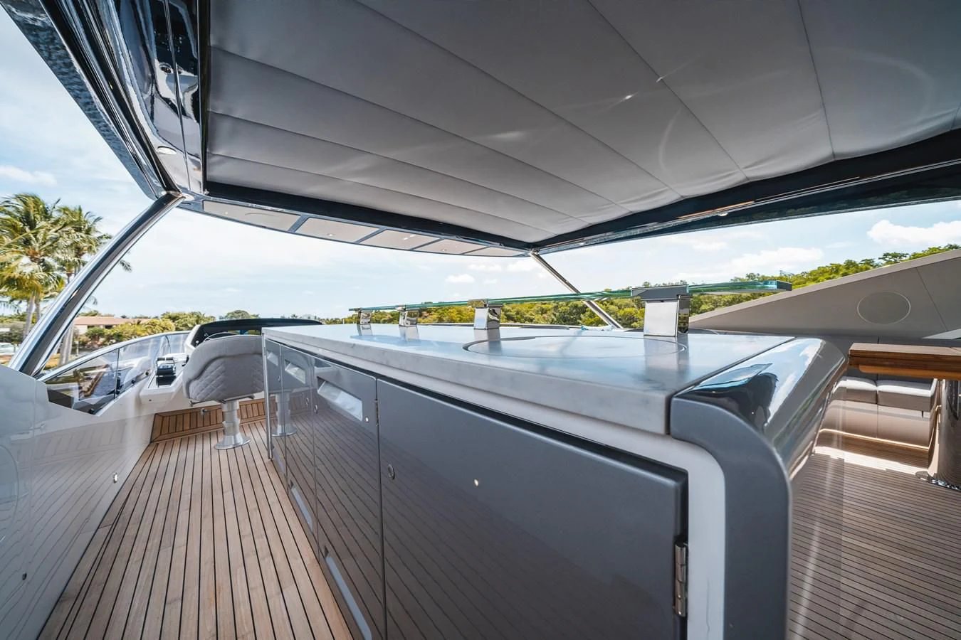 a deck with a railing and a railing with cars on it aboard 90 OCEAN Yacht for Sale