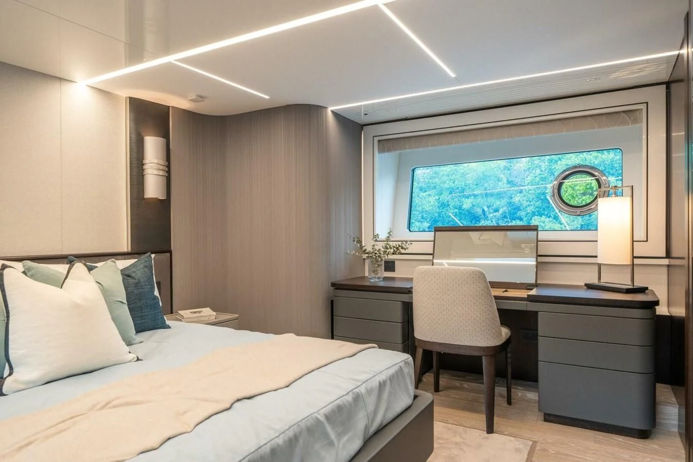 a room with a bed and a desk aboard 90 OCEAN Yacht for Sale