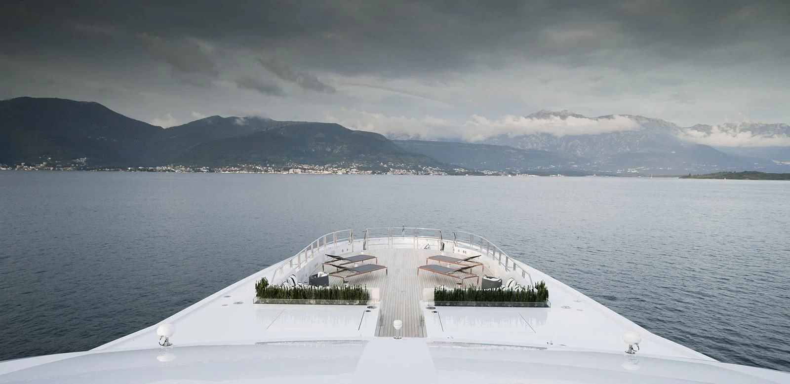 a white boat on a dock aboard GAJA Yacht for Sale