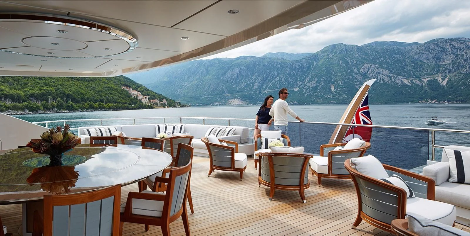a couple sitting on a boat aboard GAJA Yacht for Sale