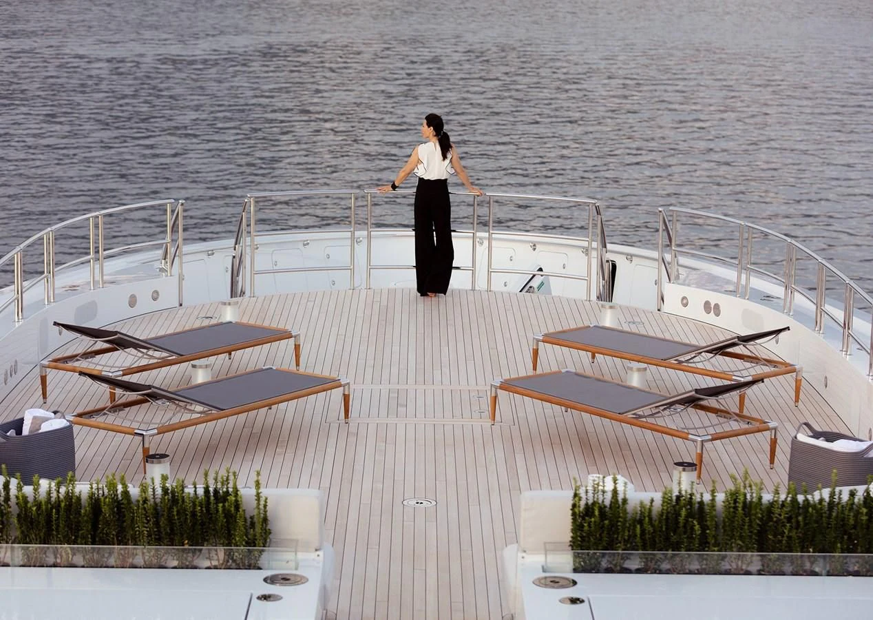 a person standing on a dock aboard GAJA Yacht for Sale