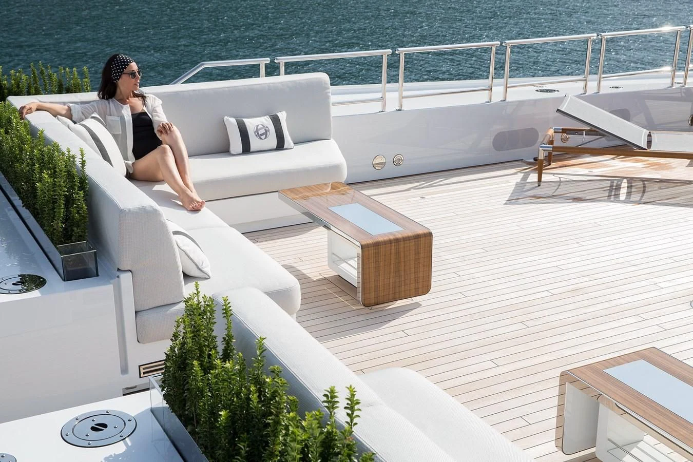 a person sitting on a balcony aboard GAJA Yacht for Sale