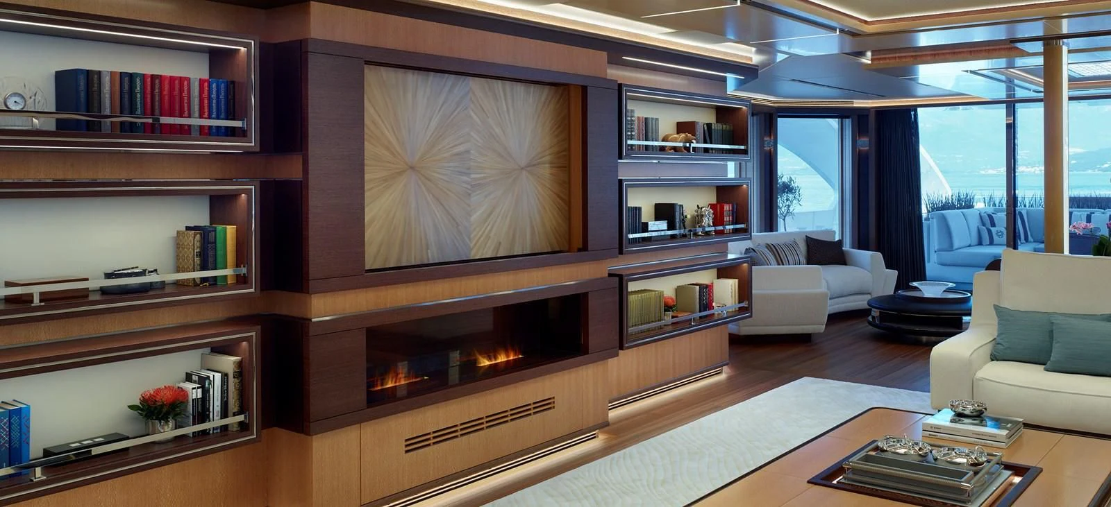 a living room with a fireplace aboard GAJA Yacht for Sale