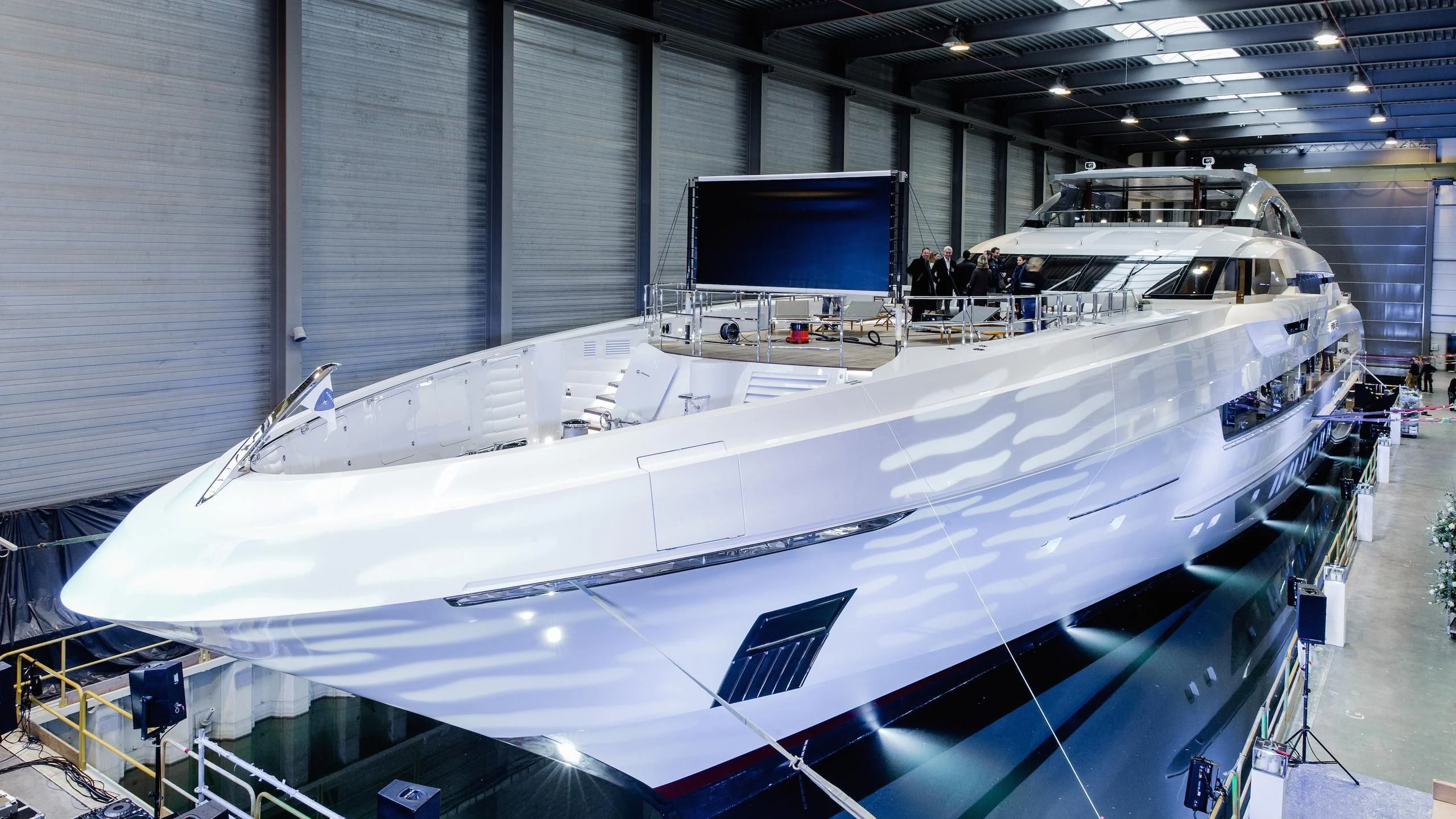 a large white ship in a building aboard GAJA Yacht for Sale