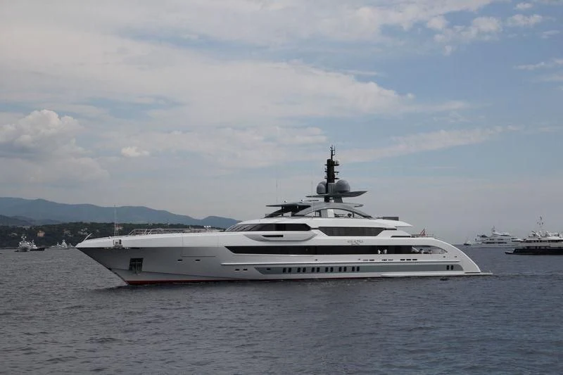 a large white yacht in the water aboard GAJA Yacht for Sale