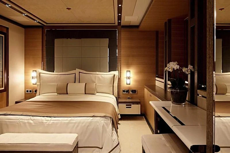 a hotel room with a bed aboard GAJA Yacht for Sale