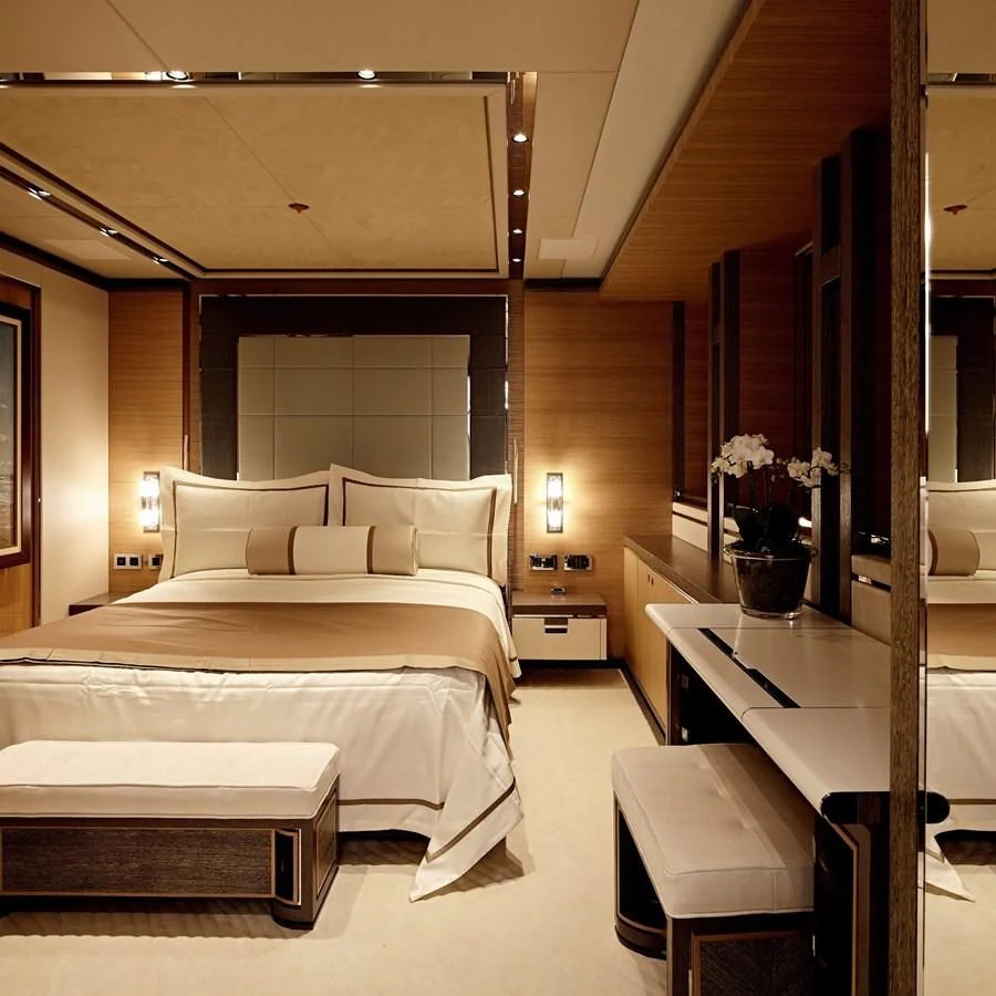 a hotel room with a bed aboard GAJA Yacht for Sale