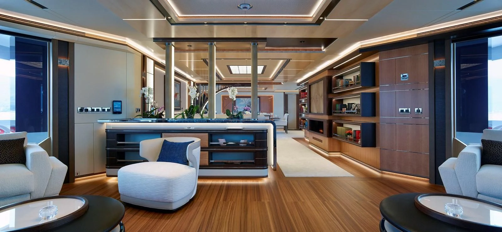 a room with a large table and chairs aboard GAJA Yacht for Sale