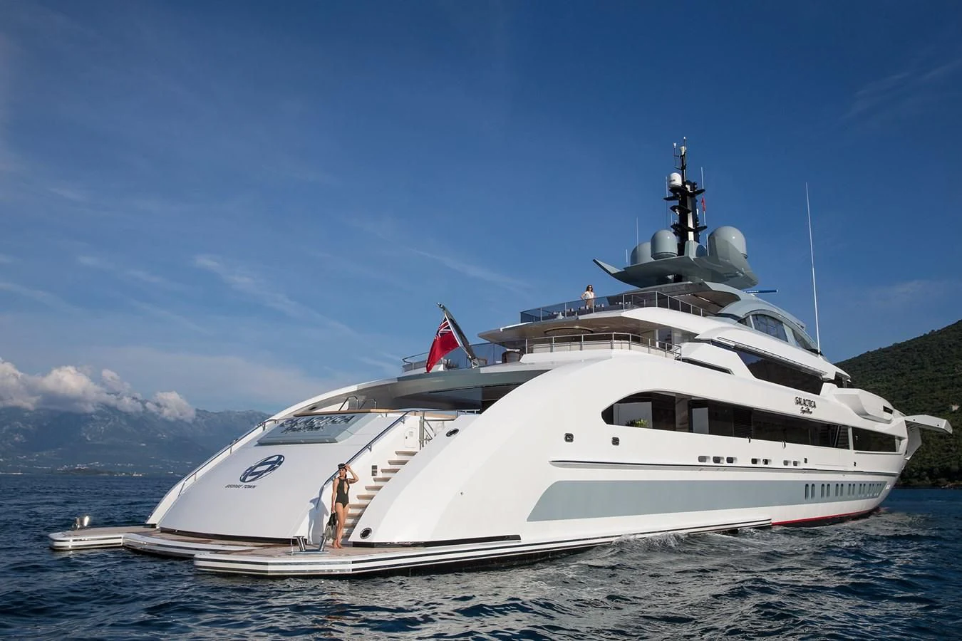 a white yacht on a beach aboard GAJA Yacht for Sale