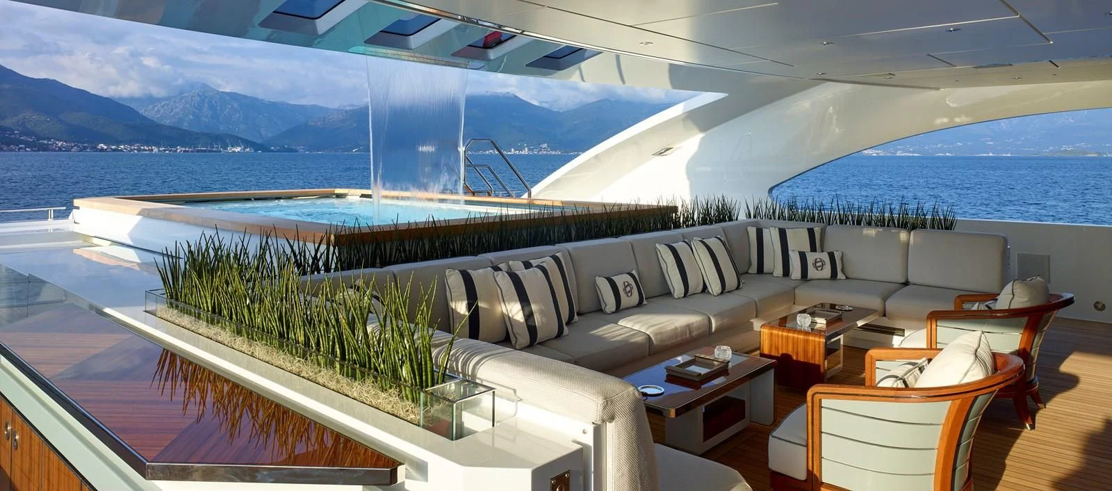 a living room with a large pool aboard GAJA Yacht for Sale