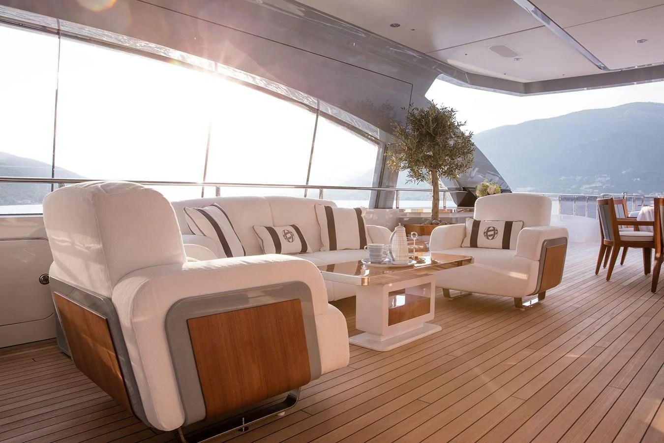 a living room with a wood floor aboard GAJA Yacht for Sale
