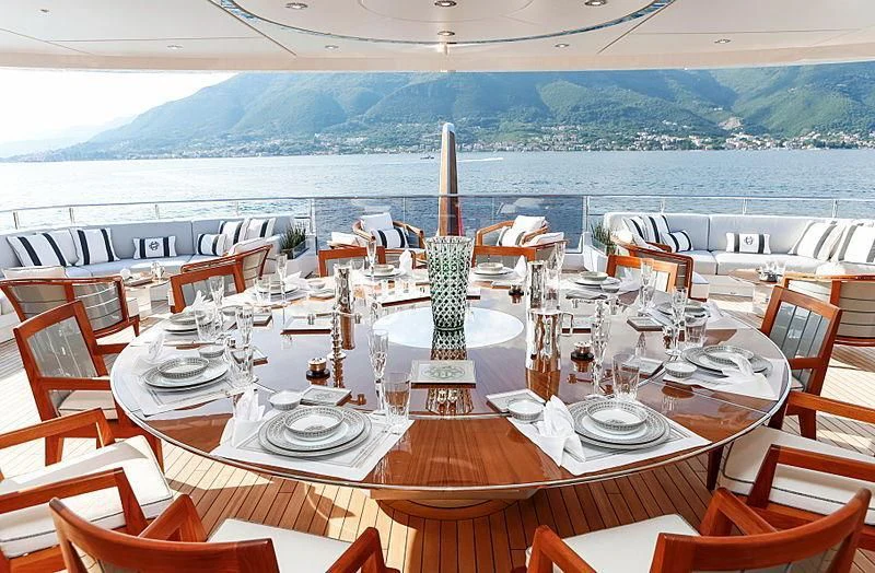 a table set for a dinner party aboard GAJA Yacht for Sale