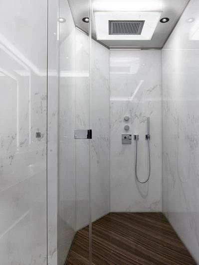 a white wall with a metal door aboard GAJA Yacht for Sale