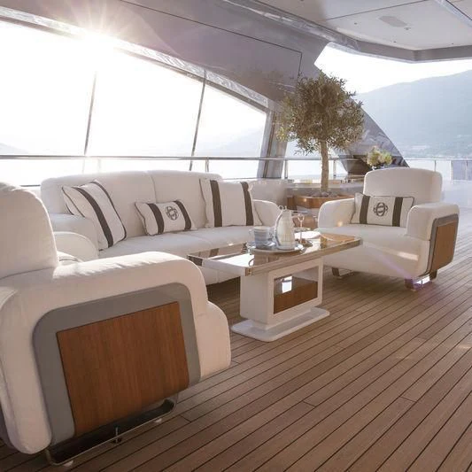a living room with a large window aboard GAJA Yacht for Sale