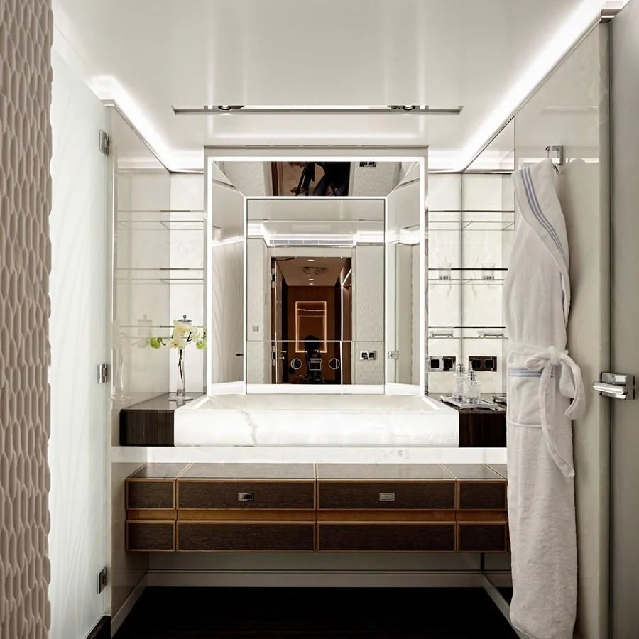 a bathroom with a large mirror aboard GAJA Yacht for Sale