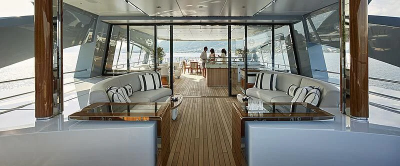 a room with a couch and a table aboard GAJA Yacht for Sale