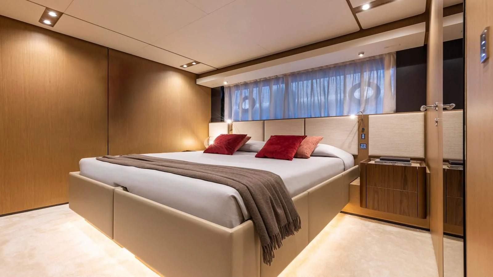 a room with a bed and a desk aboard FERRETTI 1000 Yacht for Sale