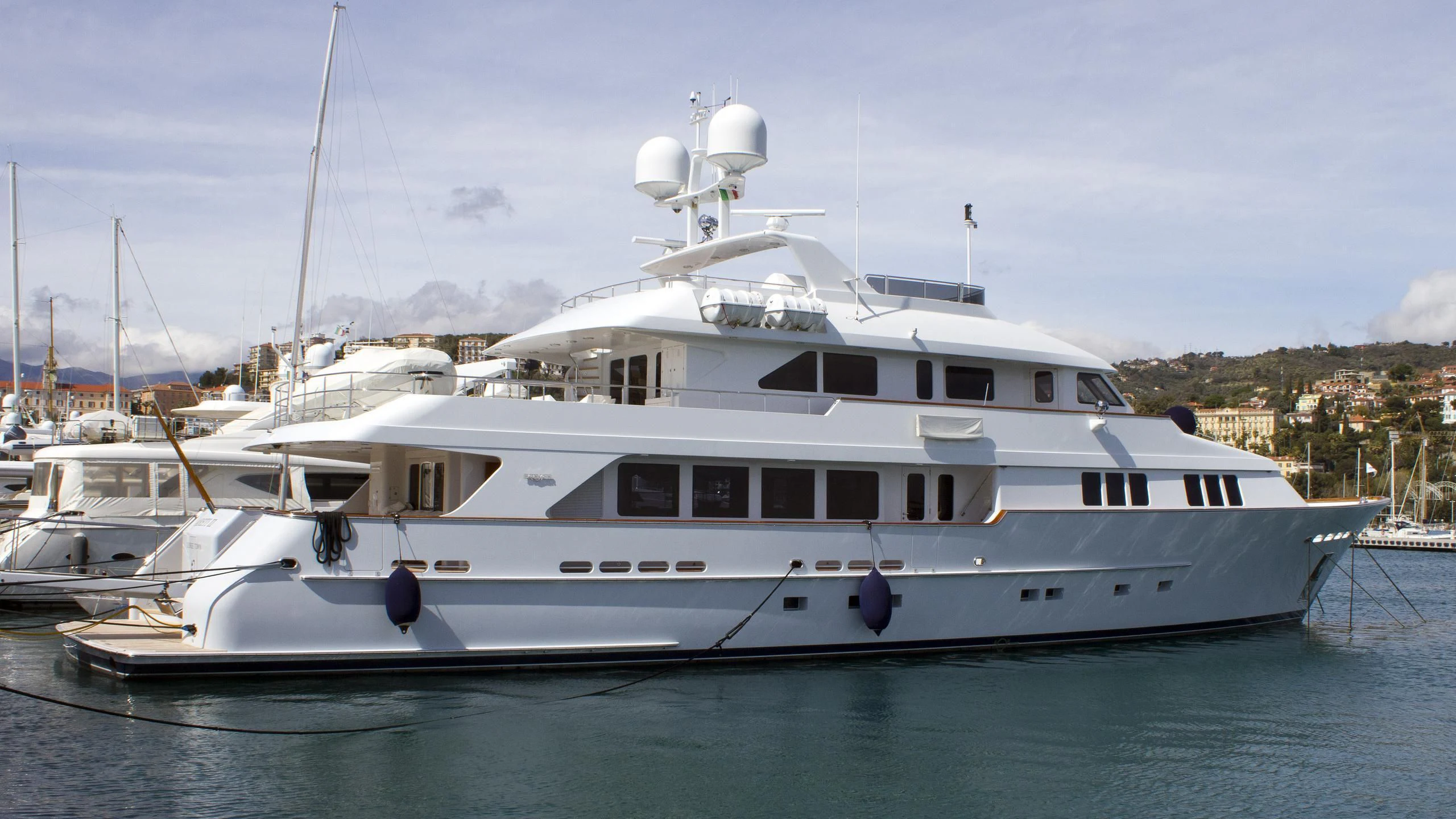 a white yacht in the water aboard MAMAMIA Yacht for Sale