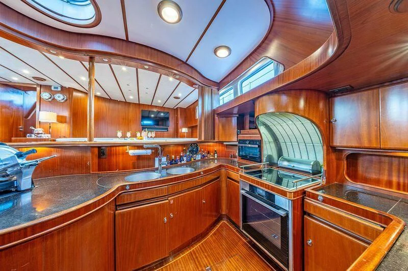 a kitchen with a large countertop aboard GUADALUPE Yacht for Sale