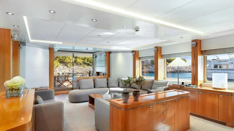 a living room with a large window aboard ALMA Yacht for Sale
