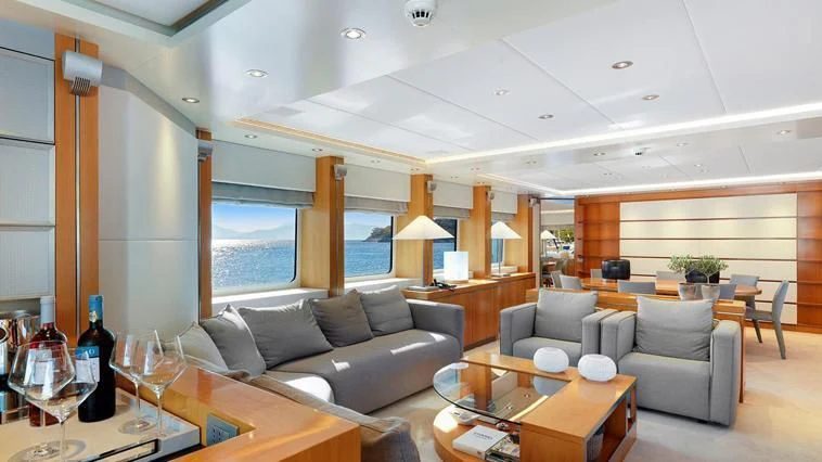 a living room with a large window aboard ALMA Yacht for Sale