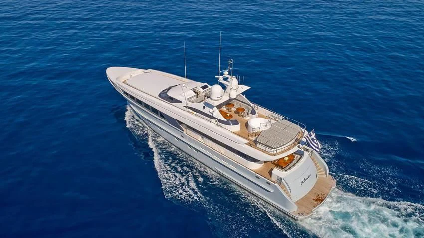 a white boat in the water aboard ALMA Yacht for Sale