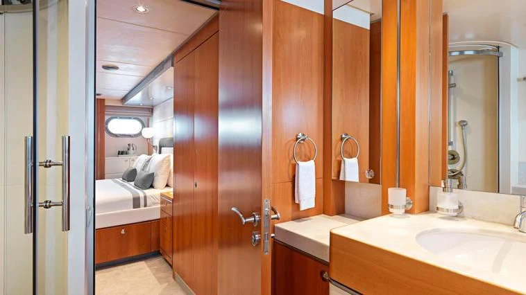 a bathroom with a shower and sink aboard ALMA Yacht for Sale