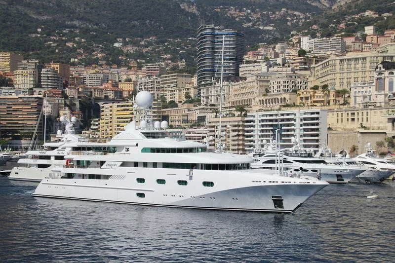a large white boat in the water aboard PEGASUS VIII Yacht for Sale