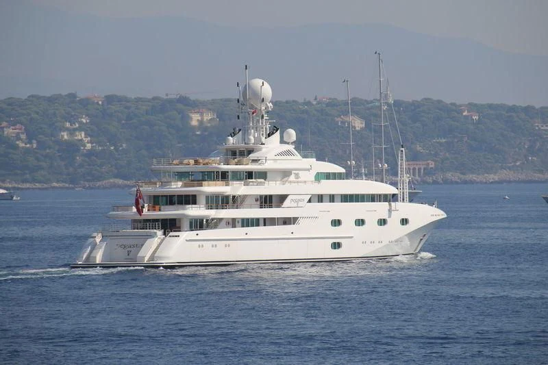 a white boat on the water aboard PEGASUS VIII Yacht for Sale