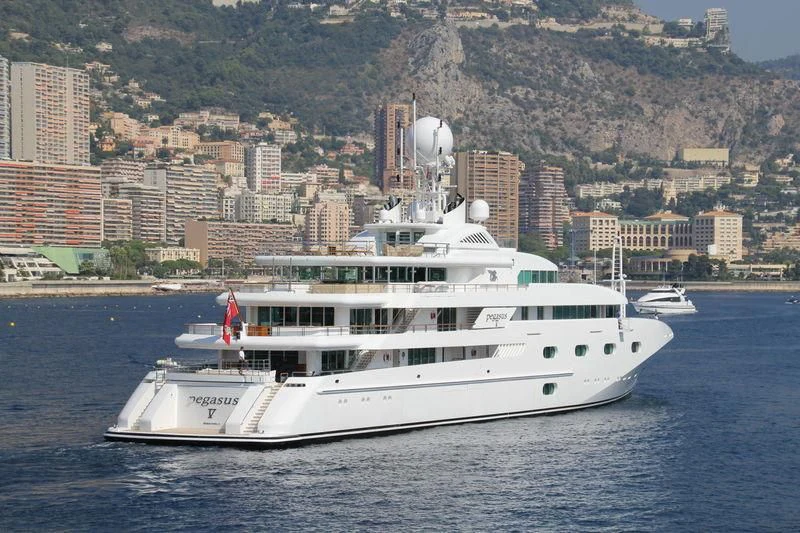 a white boat on the water aboard PEGASUS VIII Yacht for Sale