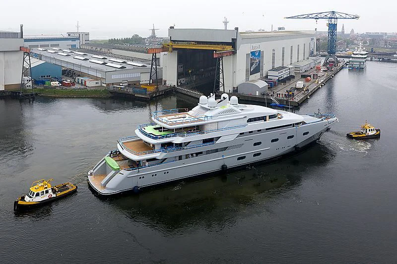 a large ship in a harbor aboard PEGASUS VIII Yacht for Sale