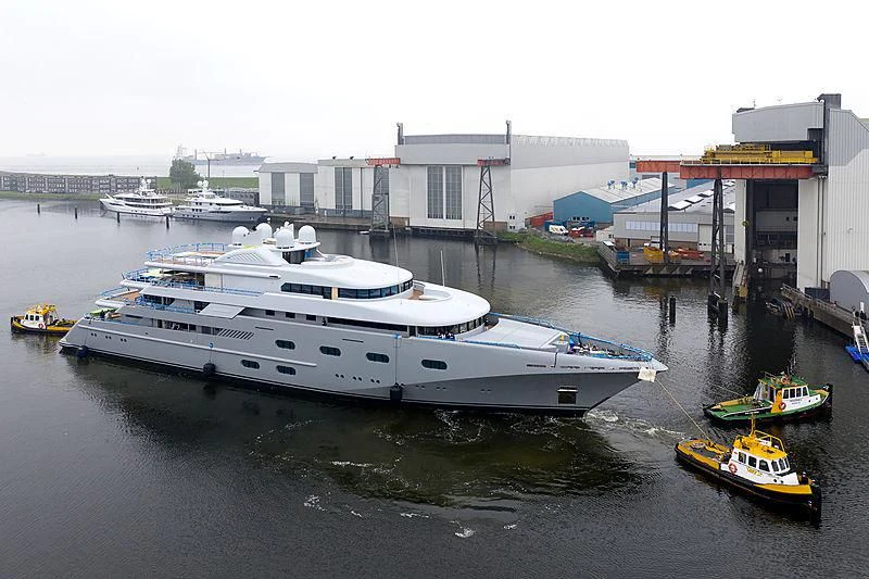 a large ship docked at a pier aboard PEGASUS VIII Yacht for Sale