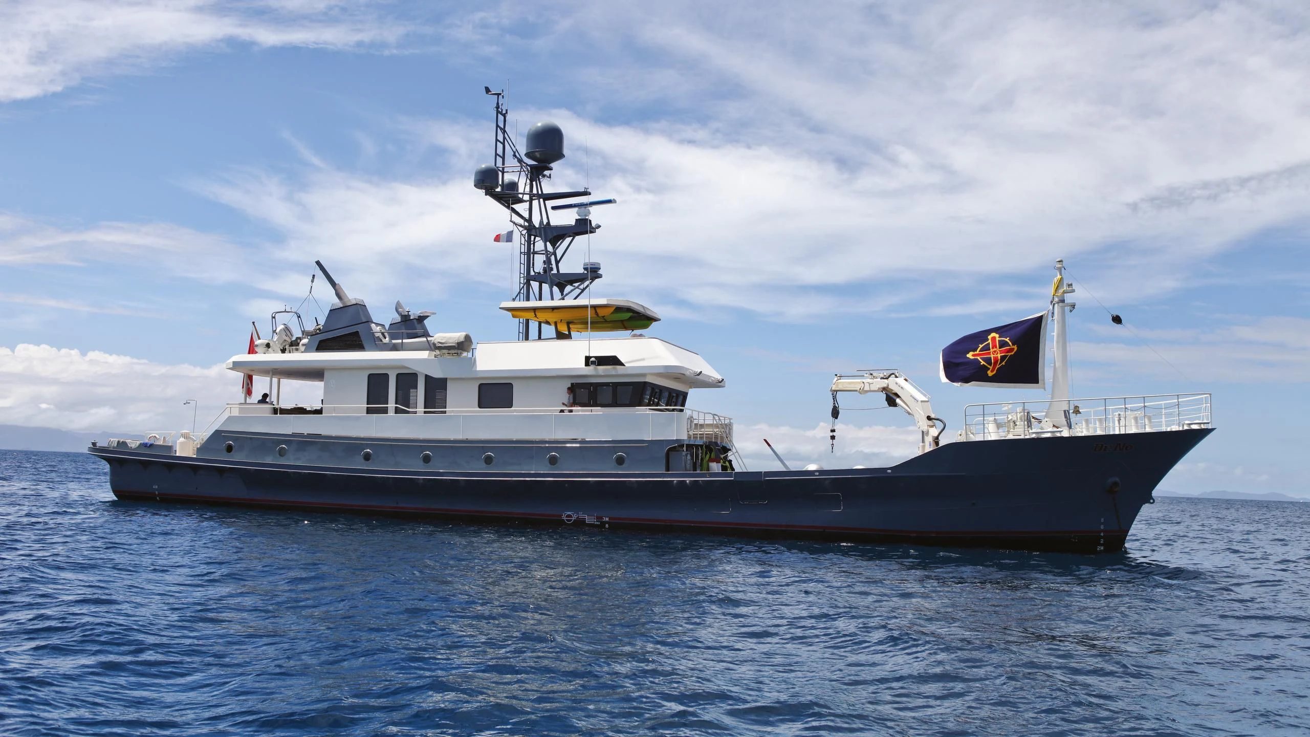 a large boat in the water aboard DR. NO Yacht for Sale
