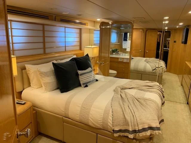 a bed with pillows and pillows aboard LONE STAR Yacht for Sale
