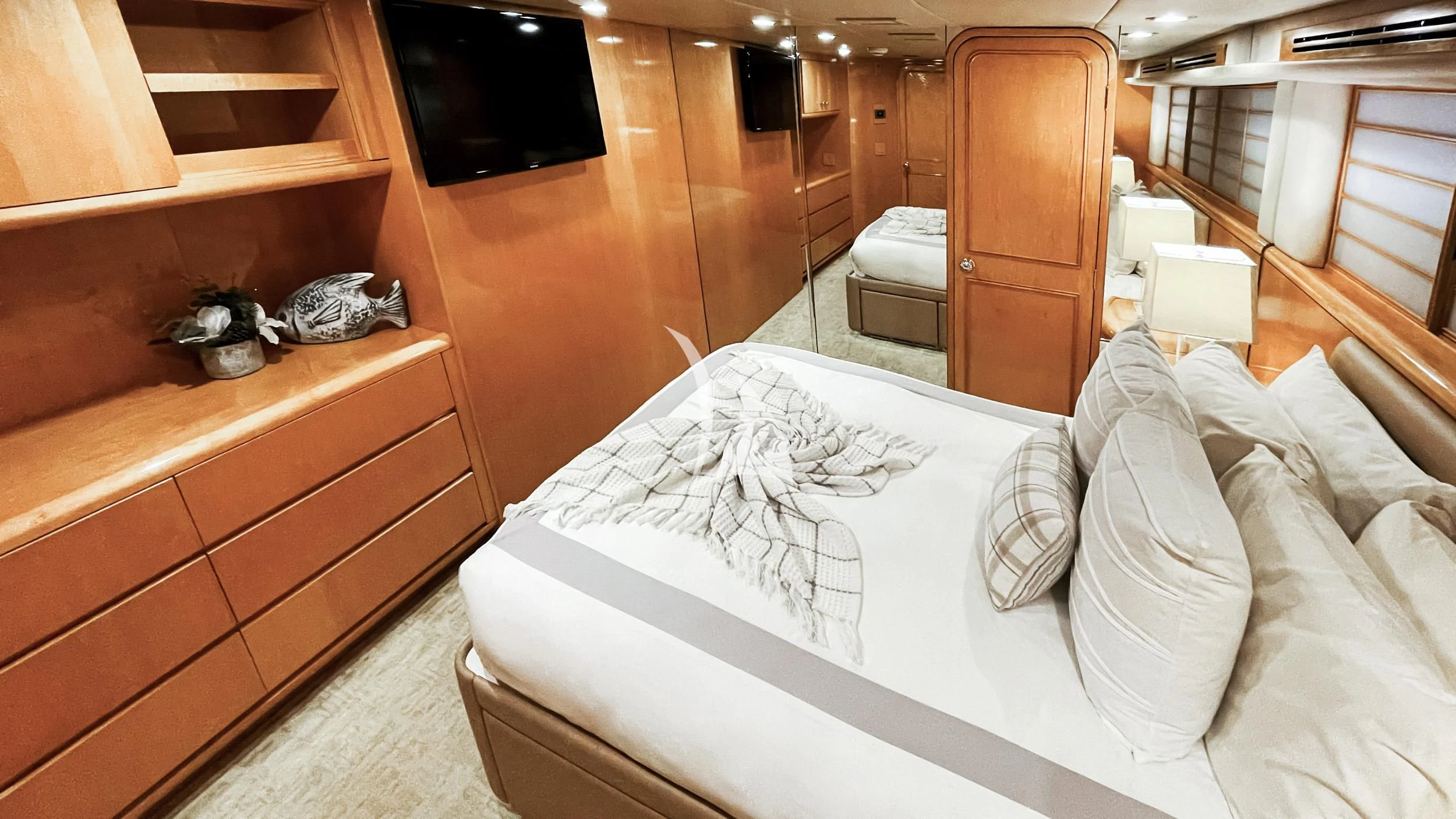 a bed in a room aboard LONE STAR Yacht for Sale