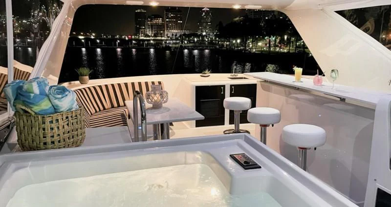 a modern kitchen with a large white countertop aboard LONE STAR Yacht for Sale