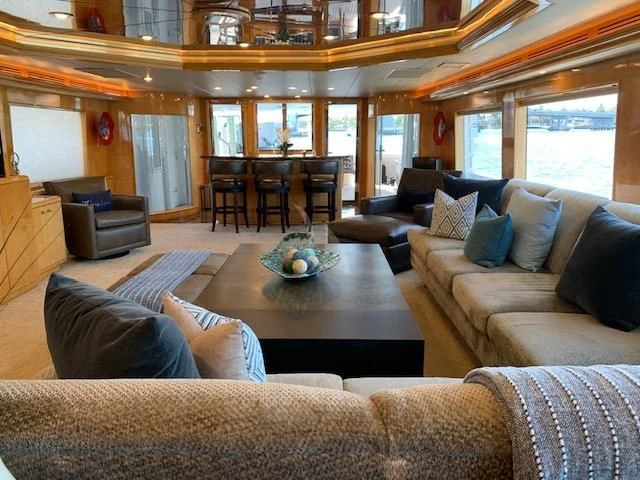 a living room with a large window aboard LONE STAR Yacht for Sale