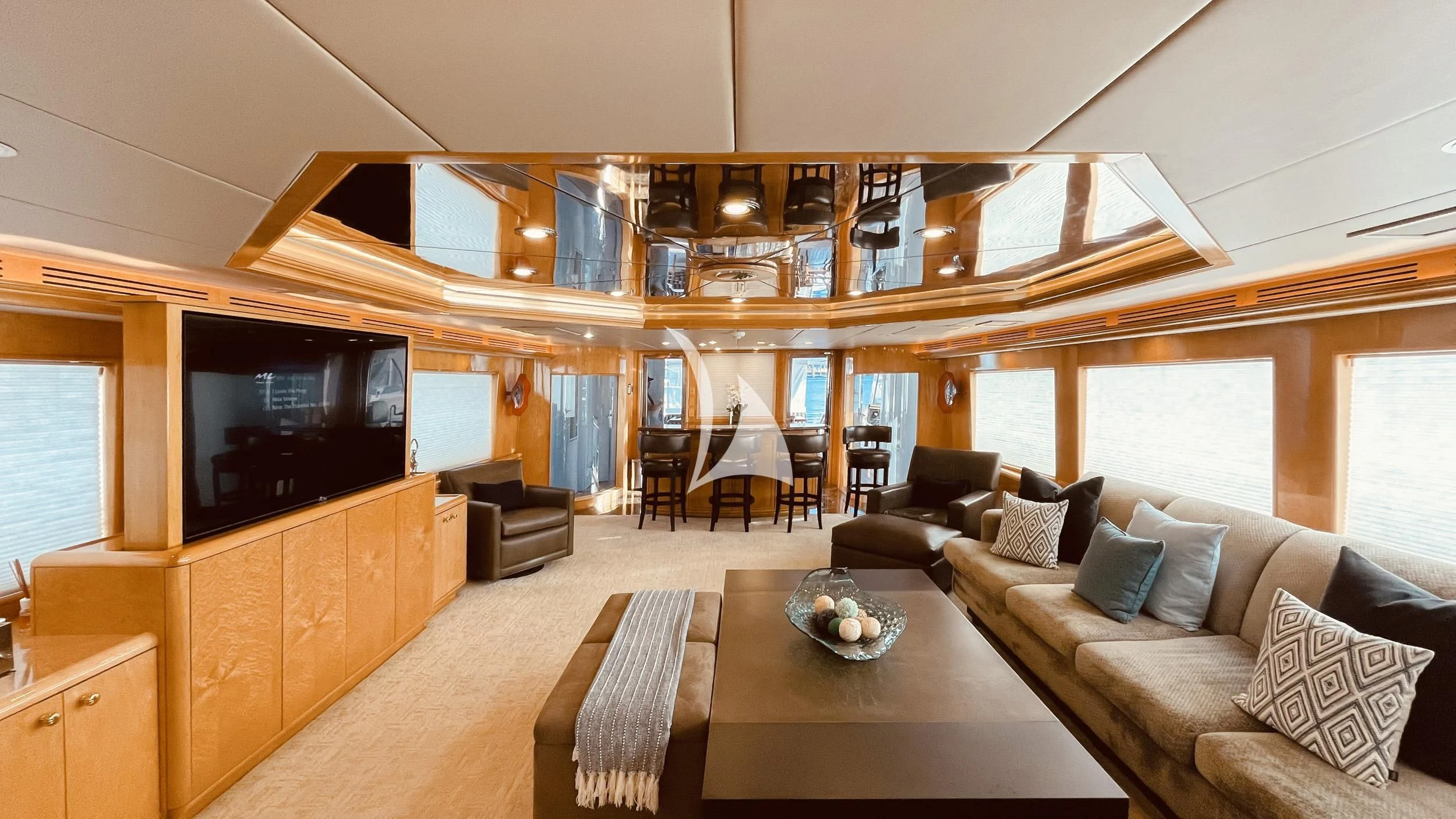 a living room with a large tv aboard LONE STAR Yacht for Sale