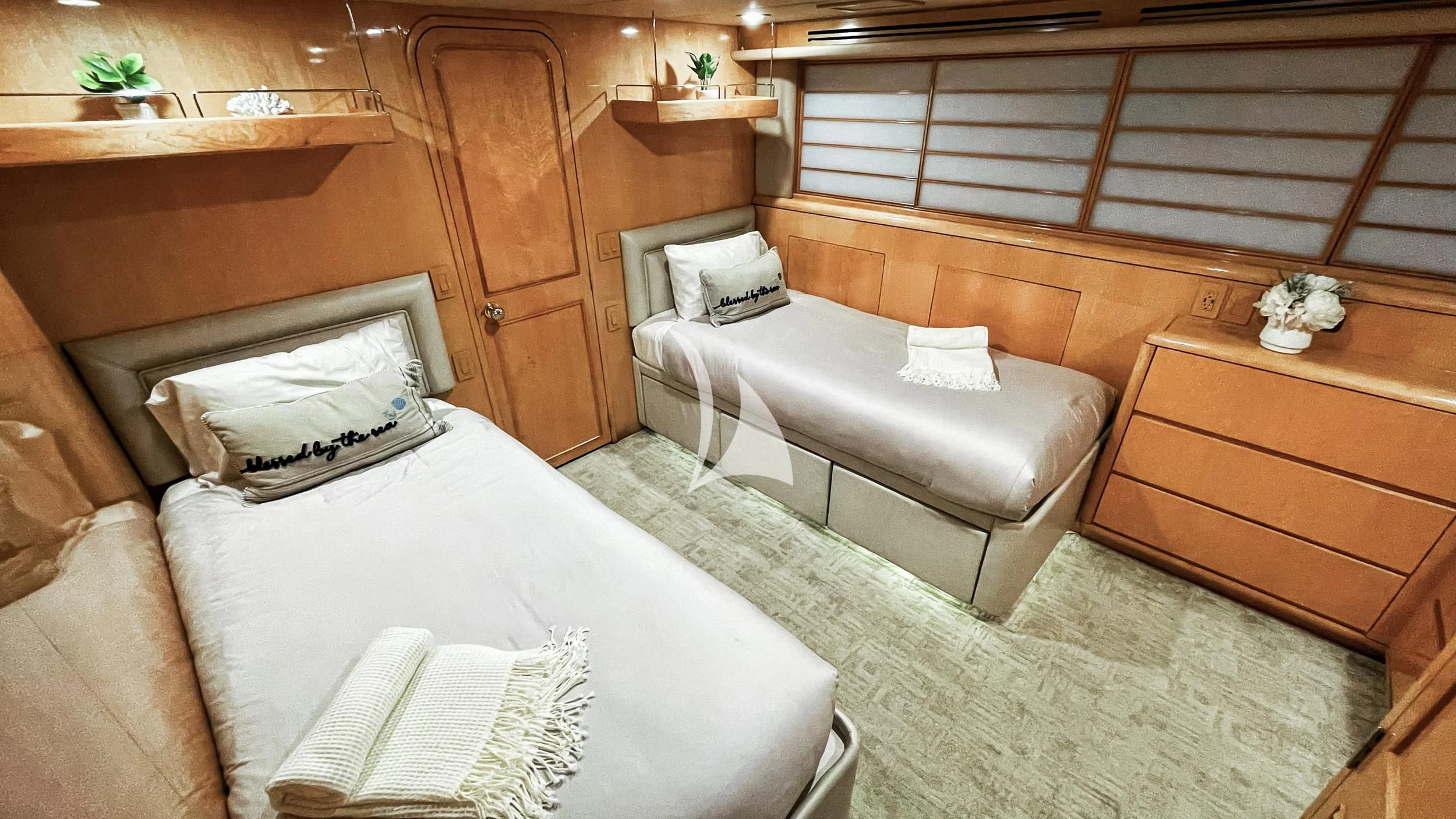 a room with a bed and a couch aboard LONE STAR Yacht for Sale