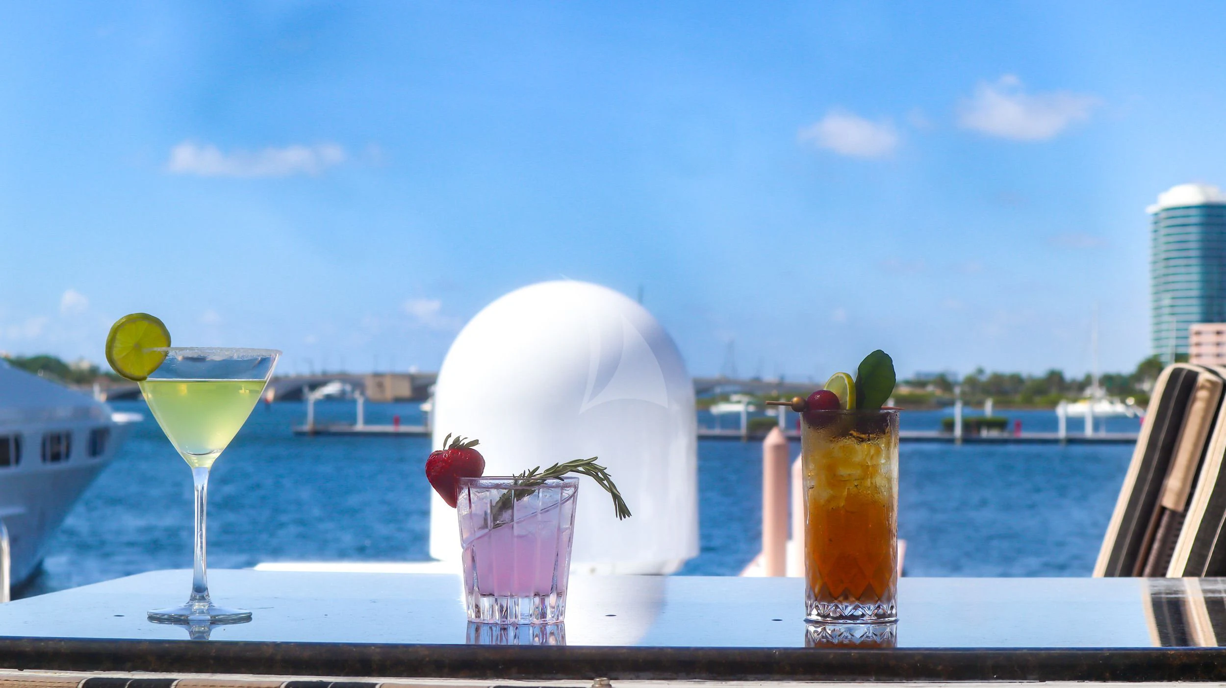 a table with drinks and fruits on it aboard LONE STAR Yacht for Sale