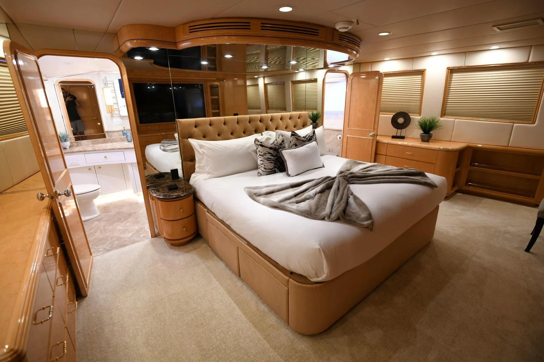 a bed in a room aboard LONE STAR Yacht for Sale
