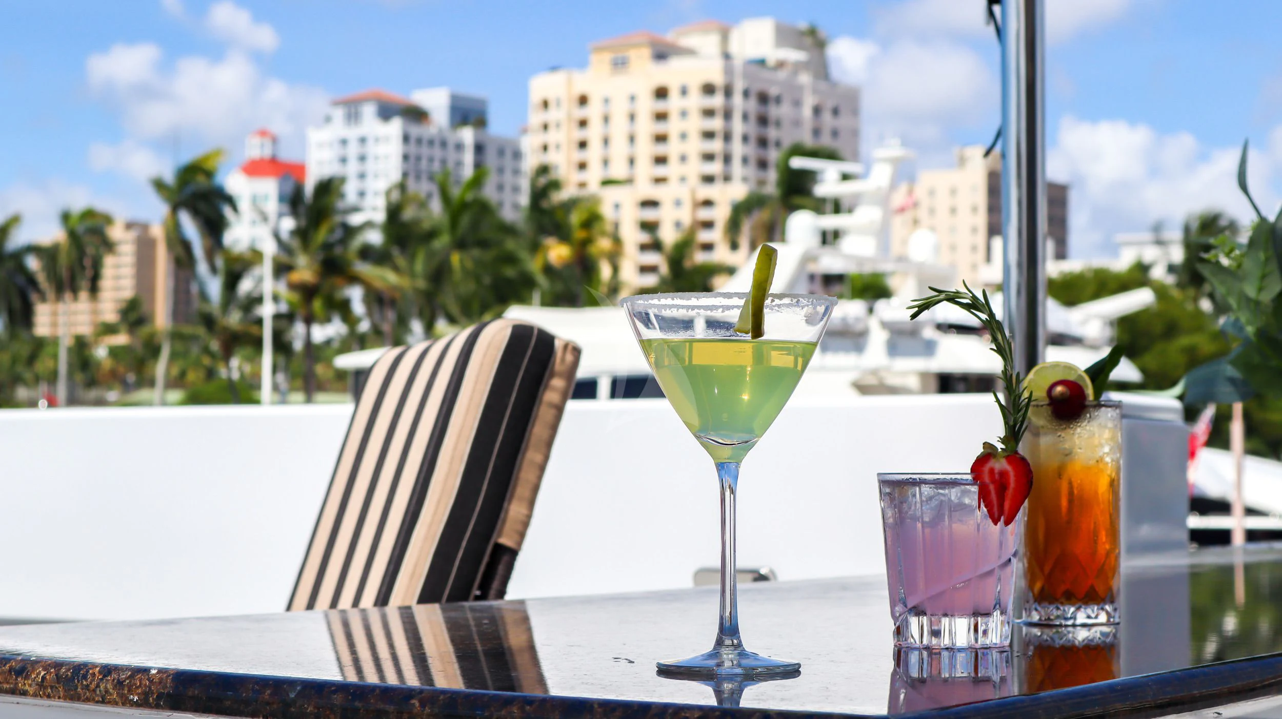 a table with drinks and fruits on it aboard LONE STAR Yacht for Sale