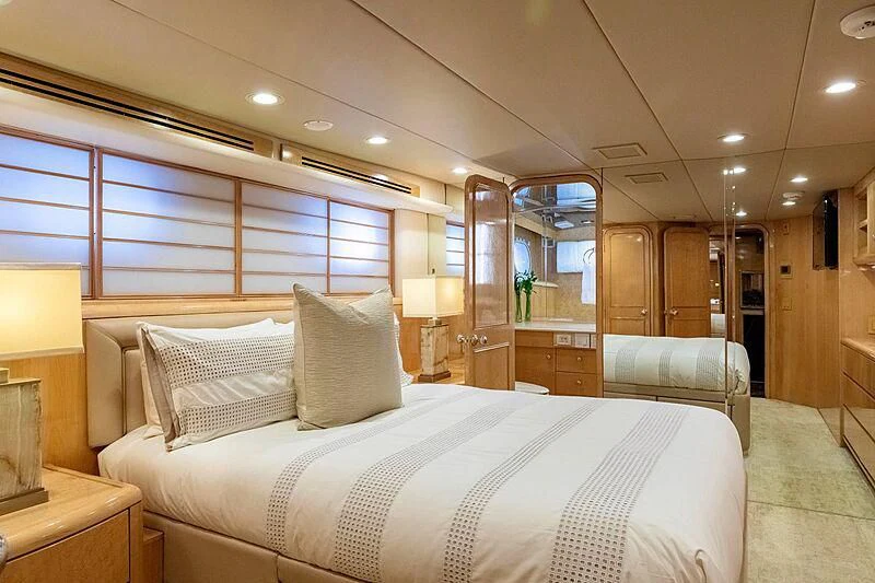a large bed in a room aboard LONE STAR Yacht for Sale