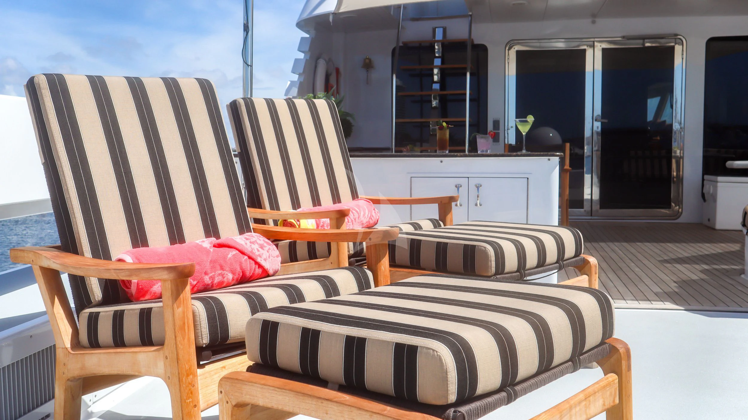 a room with chairs and a table aboard LONE STAR Yacht for Sale