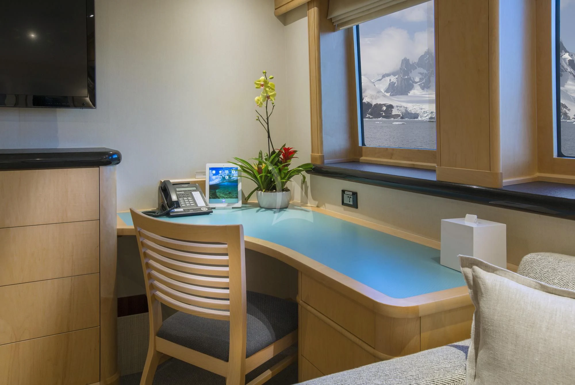 a table with a laptop on it aboard HYDRA Yacht for Sale